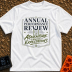 Adventure Exceeds Expectations - T-Shirt in White - A typographic badge design featuring the text 'ANNUAL PERFORMANCE...