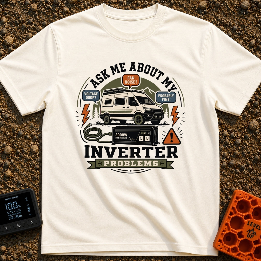 Ask About Inverter Problems - T-Shirt in Ivory - An illustration of a camper van parked near mountains and trees,...