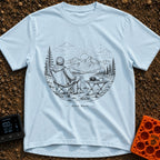 Auto Save In Progress - T-Shirt in Chambray - A black and white line drawing of a person sitting in a camp chair facing...