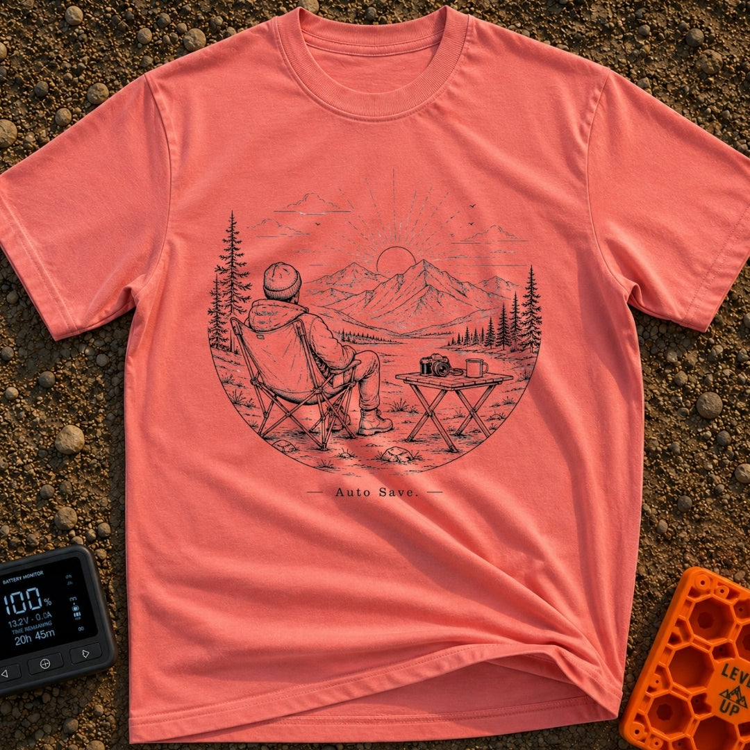 Auto Save In Progress - T-Shirt in Watermelon - A black and white line drawing of a person sitting in a camp chair facing...