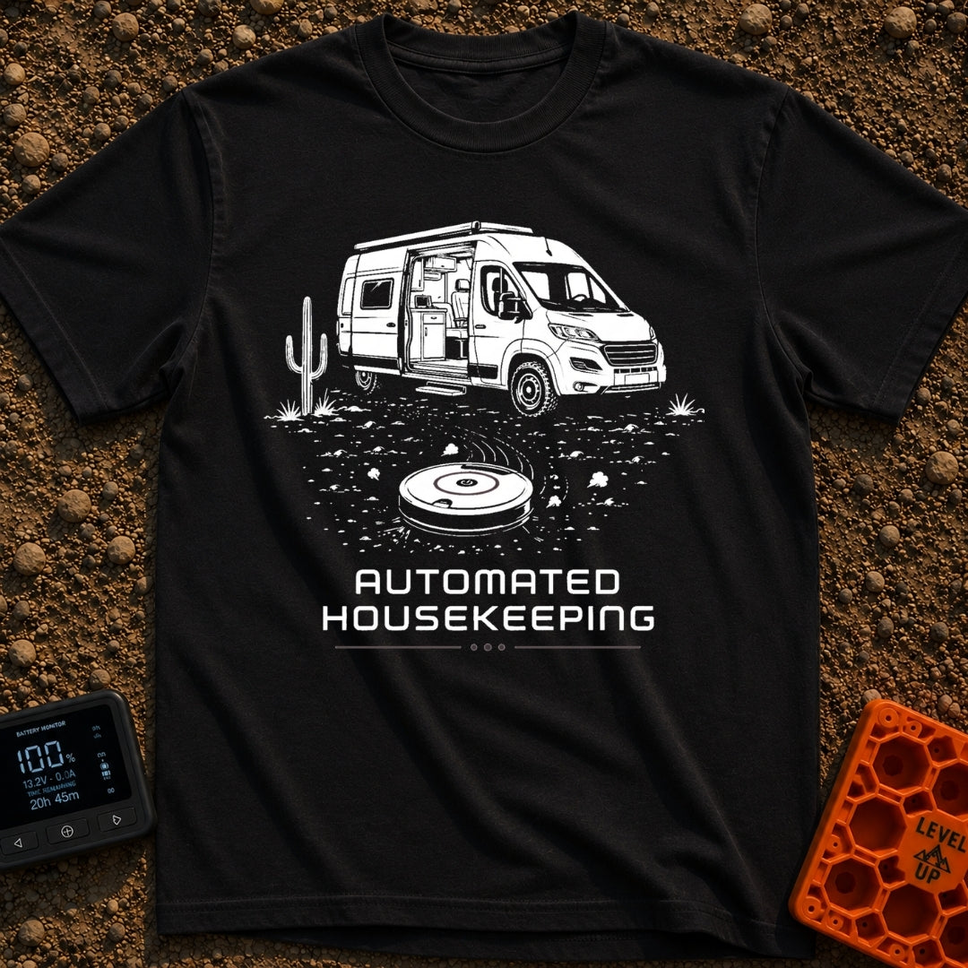 Vacuuming the Desert - T-Shirt in Black - A black and white line drawing of a camper van parked next to a cactus in a...