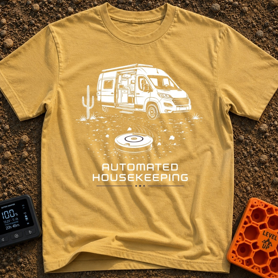 Vacuuming the Desert - T-Shirt in Mustard - A black and white line drawing of a camper van parked next to a cactus in a...