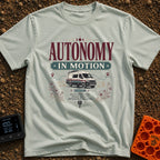 Autonomy In Motion - T-Shirt in Bay - A vintage-style illustration of a camper van driving through a desert landscape...