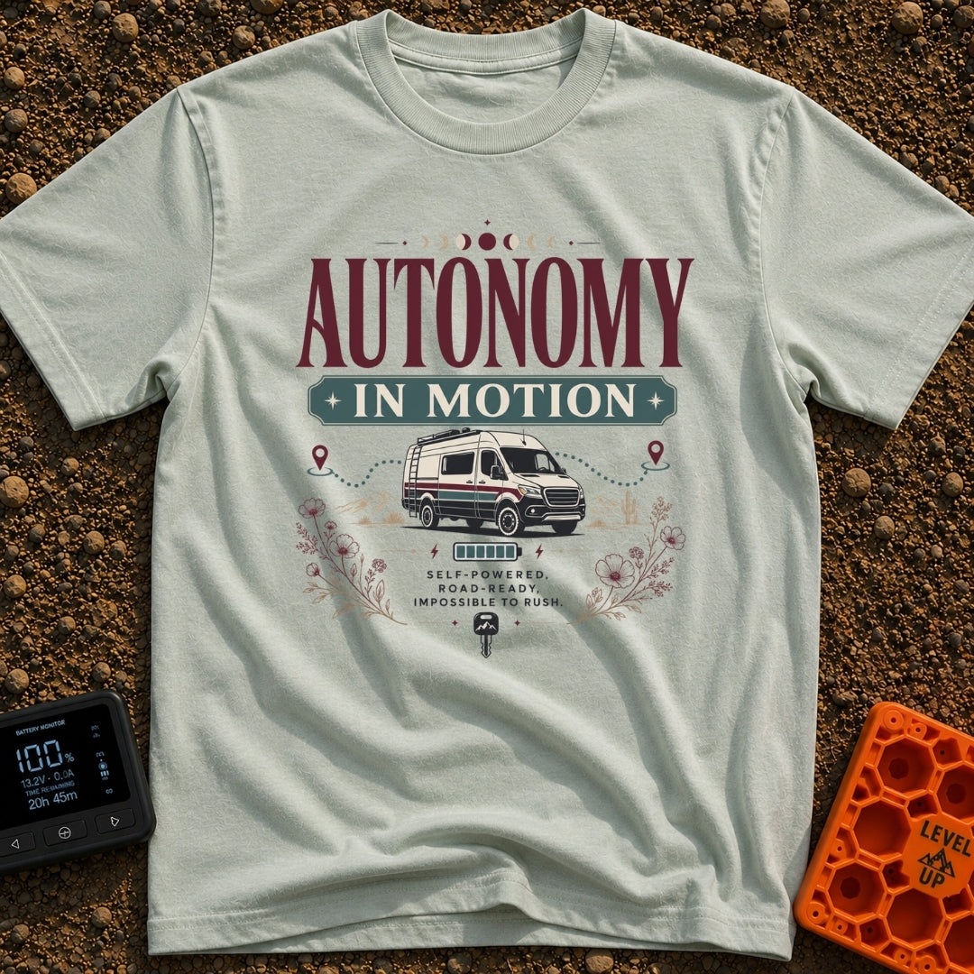 Autonomy In Motion - T-Shirt in Bay - A vintage-style illustration of a camper van driving through a desert landscape...