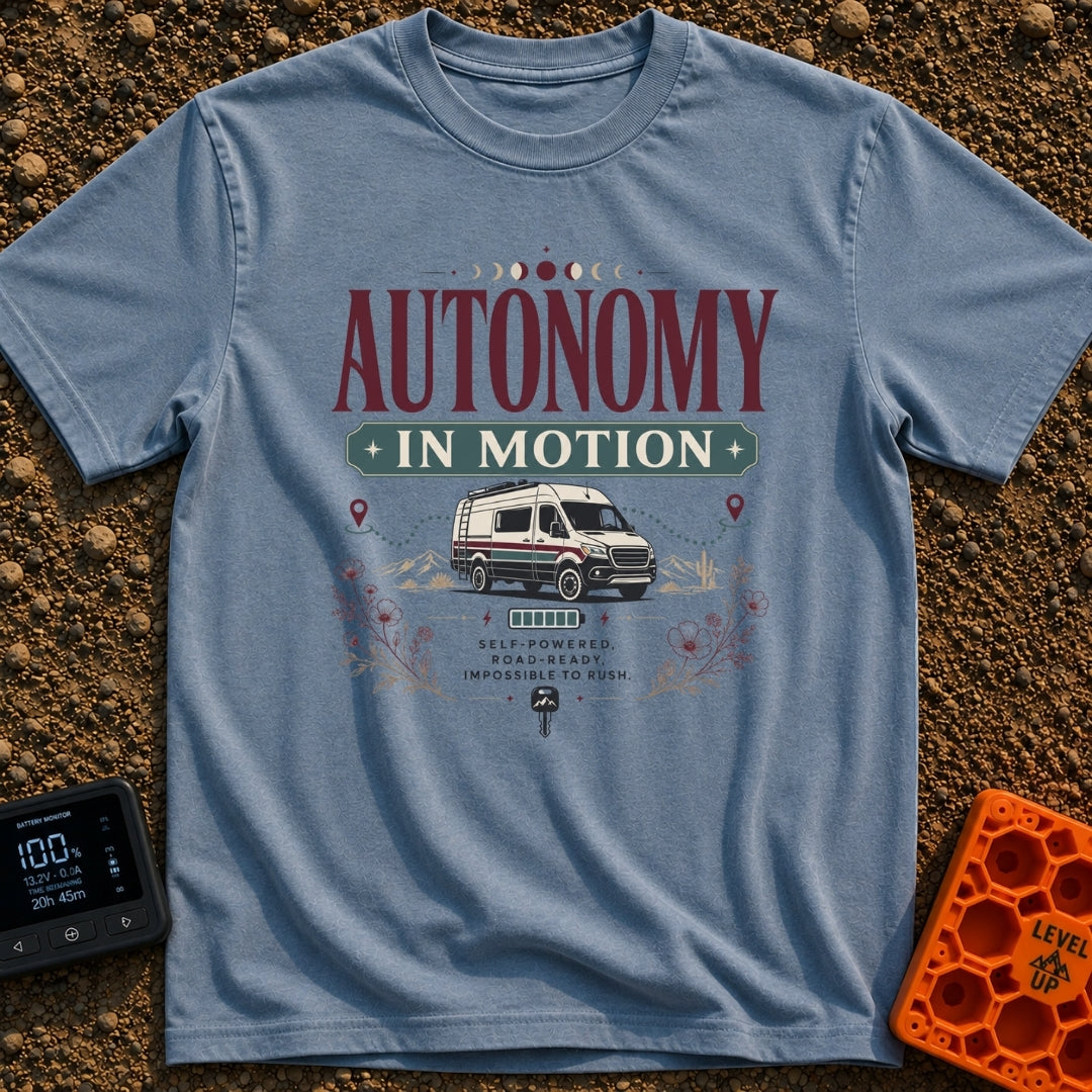 Autonomy In Motion - T-Shirt in Blue Jean - A vintage-style illustration of a camper van driving through a desert...