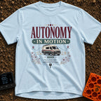 Autonomy In Motion - T-Shirt in Chambray - A vintage-style illustration of a camper van driving through a desert...