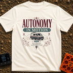 Autonomy In Motion - T-Shirt in Ivory - A vintage-style illustration of a camper van driving through a desert landscape...