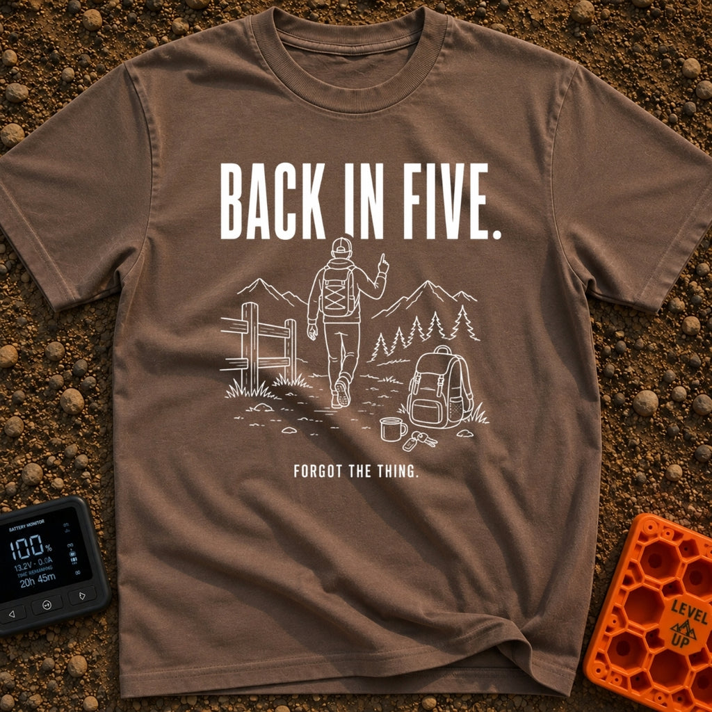 Back In Five Years - T-Shirt in Espresso - White line art on a black background showing a hiker with a backpack walking...