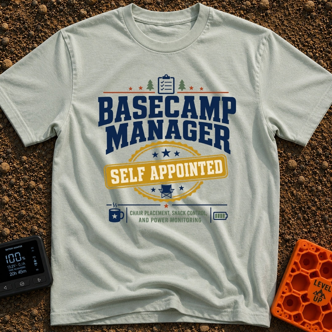 Self Appointed Basecamp Manager - T-Shirt in Bay - A typographic design reading 'BASECAMP MANAGER' in large navy letters...