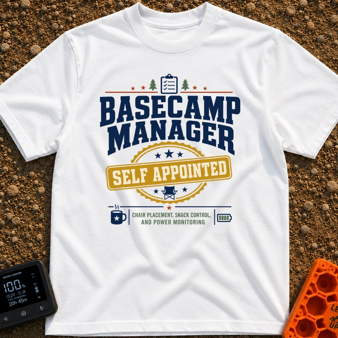 Self Appointed Basecamp Manager - T-Shirt in White - A typographic design reading 'BASECAMP MANAGER' in large navy...