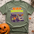 Bats Need No Apps - T-Shirt in Moss - A cartoon illustration featuring three purple bats interacting with a large GPS...