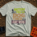 Battery Full Dog Tired - T-Shirt in Bay - A typographic design reading "BATTERY FULL DOG TIRED DAY WON" featuring a...