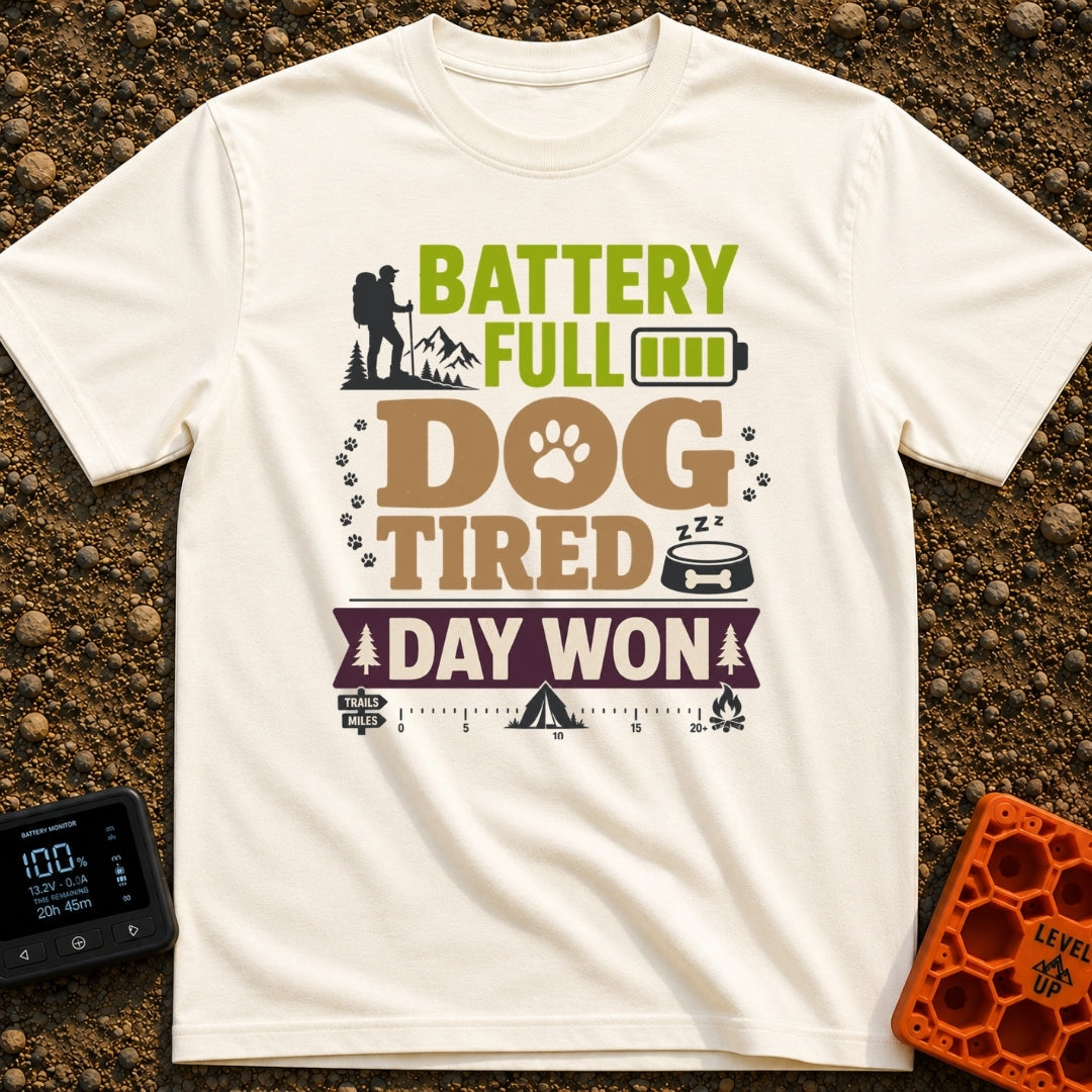 Battery Full Dog Tired - T-Shirt in Ivory - A typographic design reading "BATTERY FULL DOG TIRED DAY WON" featuring a...