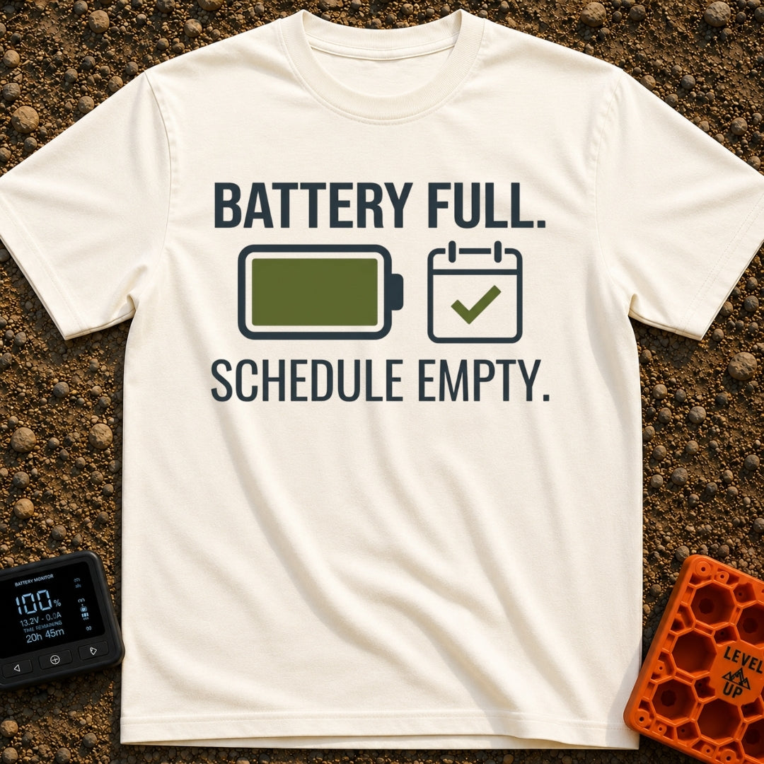Fully Charged Life - T-Shirt in Ivory - The design features the text "BATTERY FULL." and "SCHEDULE EMPTY." surrounding...