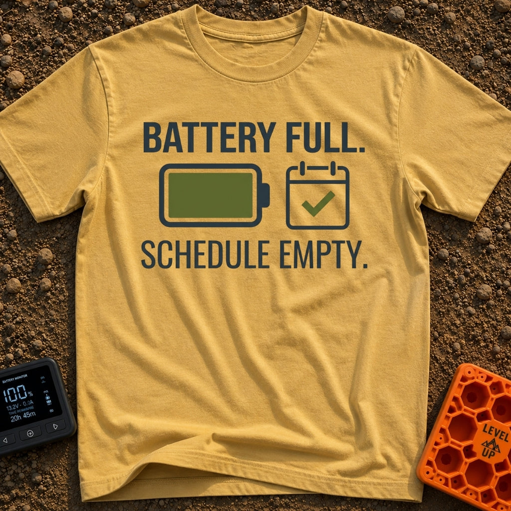 Fully Charged Life - T-Shirt in Mustard - The design features the text "BATTERY FULL." and "SCHEDULE EMPTY." surrounding...