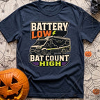 Battery Low Bats High - T-Shirt in Navy - A black Class C camper van or RV is shown with a large silhouette of a bat with...