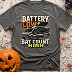 Battery Low Bats High - T-Shirt in Pepper - A black Class C camper van or RV is shown with a large silhouette of a bat...