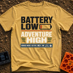 Running On Empty - T-Shirt in Mustard - A typographic design featuring the stacked text "BATTERY LOW" with a red...