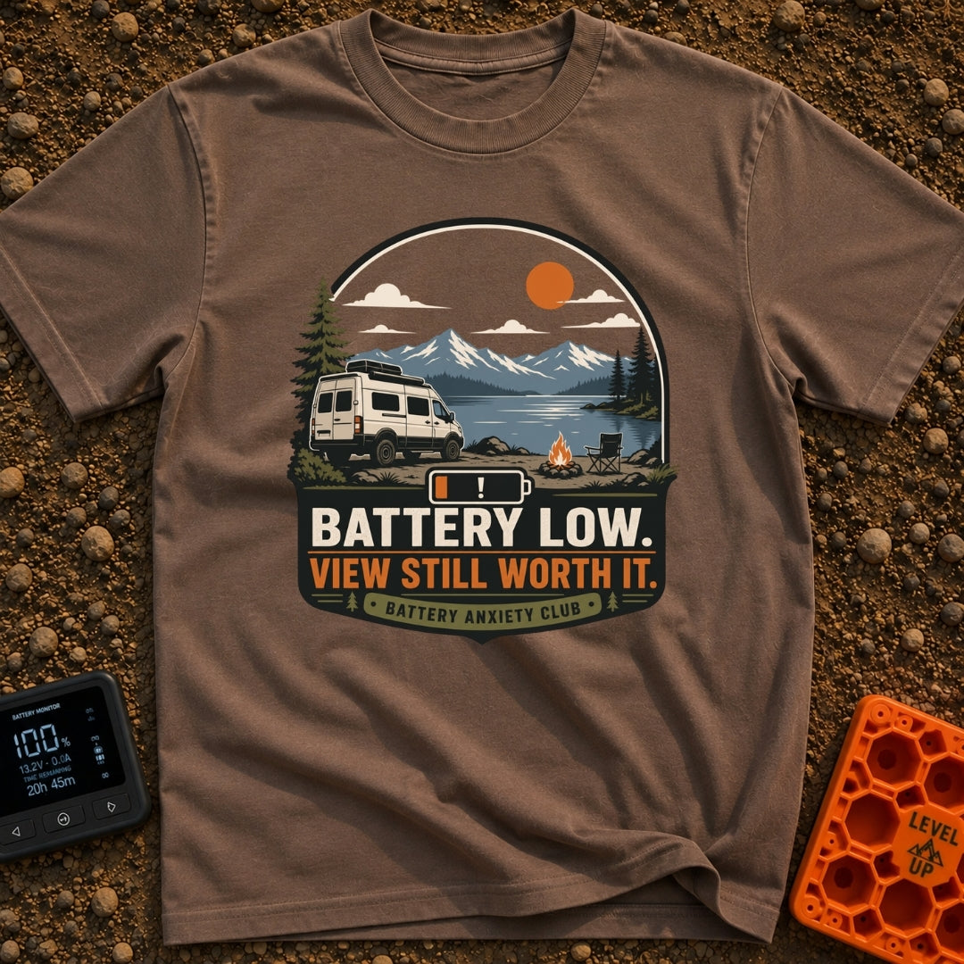 Battery Anxiety Club - T-Shirt in Espresso - A white camper van is parked beside a serene lake with mountains in the...