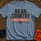 Character In Bearland - T-Shirt in Blue Jean - A vintage-style typographic design featuring the text "BEAR COUNTRY BUILDS...