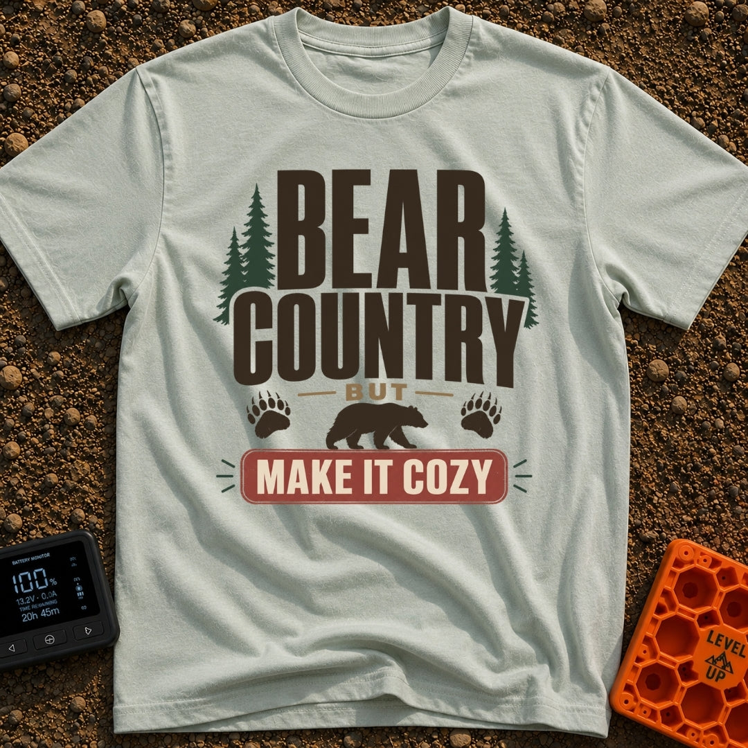 Cozy Bear Country - T-Shirt in Bay - The design features the text 'BEAR COUNTRY BUT MAKE IT COZY' in bold typography,...