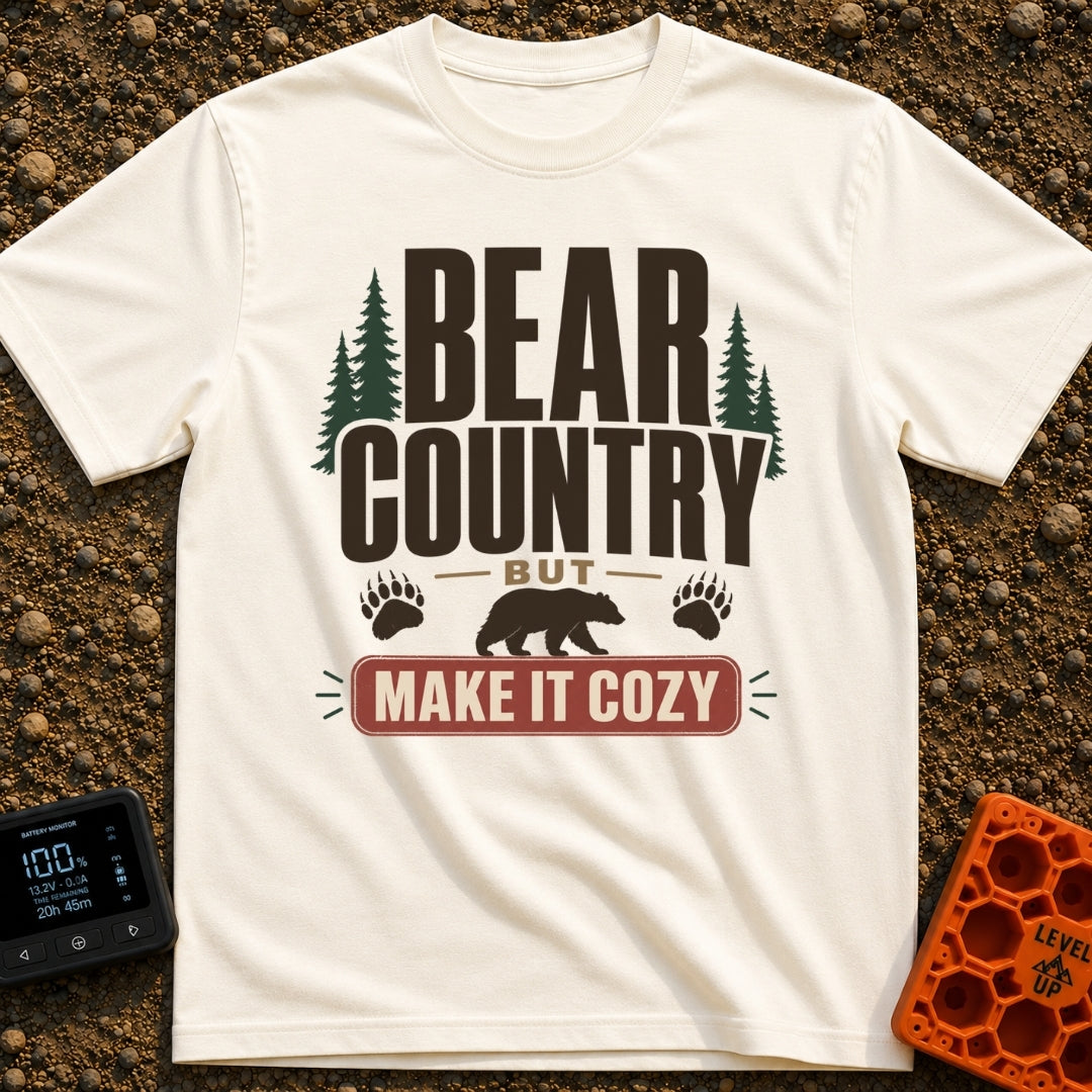 Cozy Bear Country - T-Shirt in Ivory - The design features the text 'BEAR COUNTRY BUT MAKE IT COZY' in bold typography,...