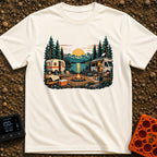 Then And Now - T-Shirt in Ivory - A detailed illustration of a campsite by a mountain lake at sunset, comparing a vintage...