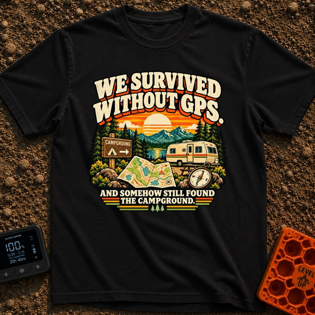 Lost In The Fold - T-Shirt in Black - A retro-style illustration featuring an unfolded paper map and a compass in the...