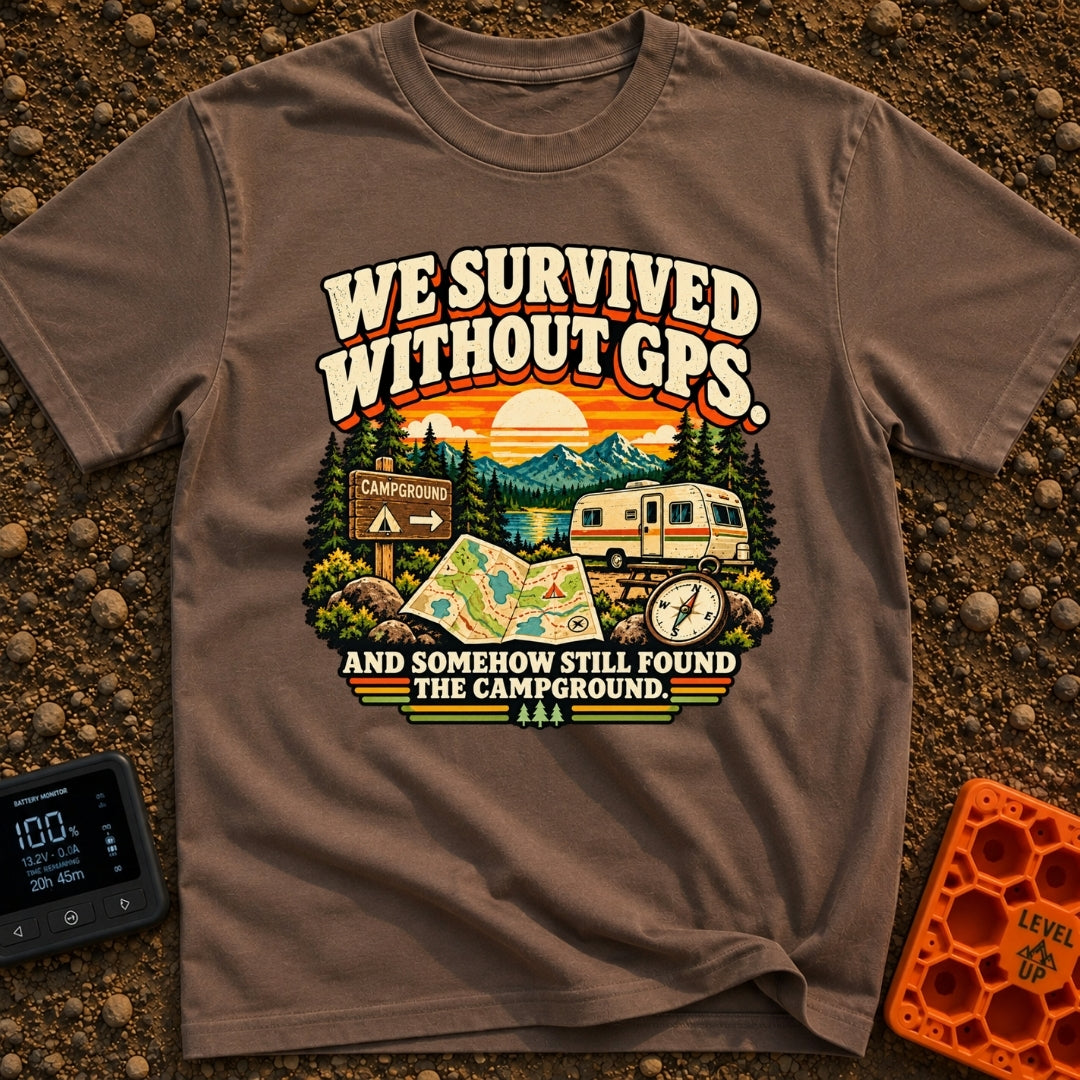 Lost In The Fold - T-Shirt in Espresso - A retro-style illustration featuring an unfolded paper map and a compass in the...