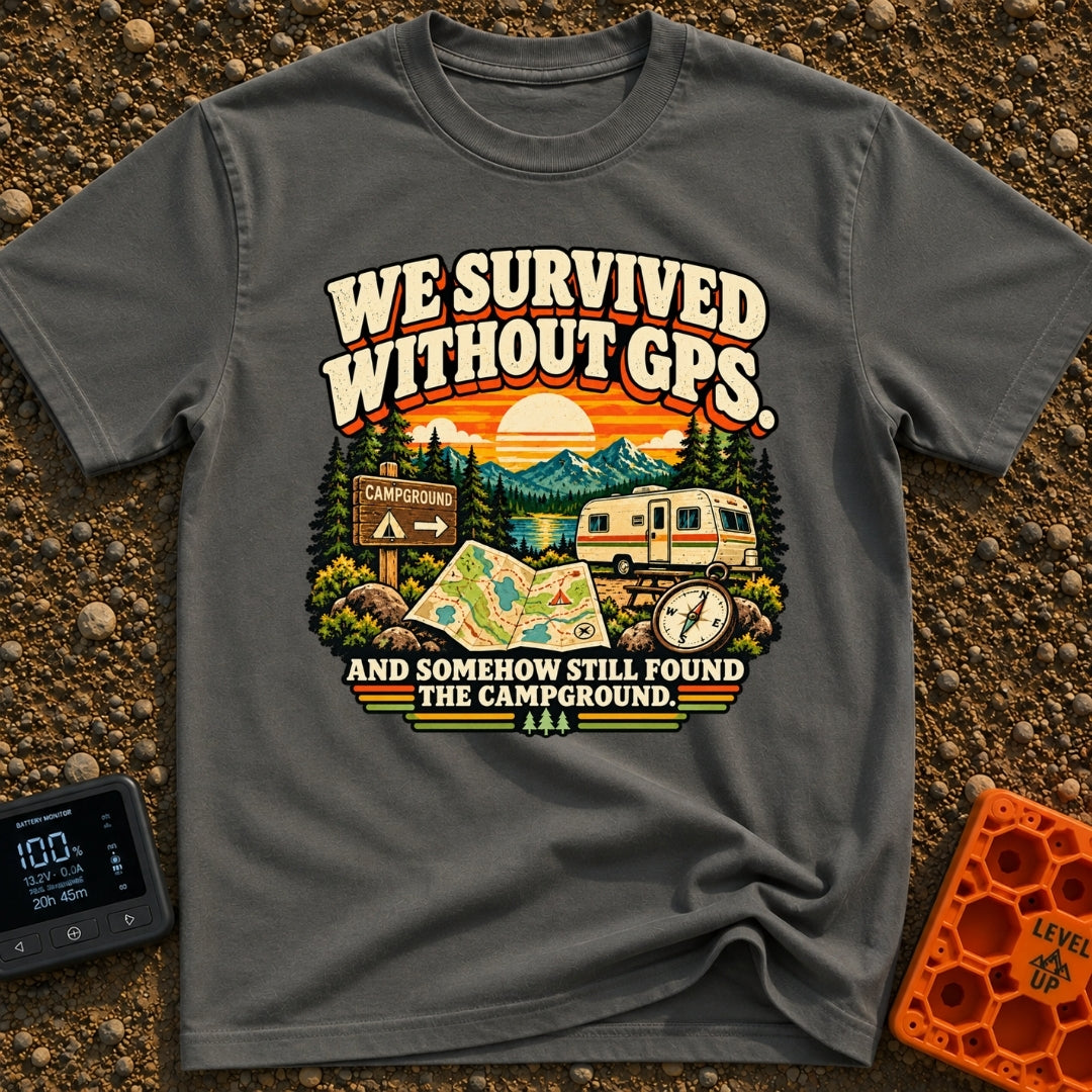 Lost In The Fold - T-Shirt in Pepper - A retro-style illustration featuring an unfolded paper map and a compass in the...