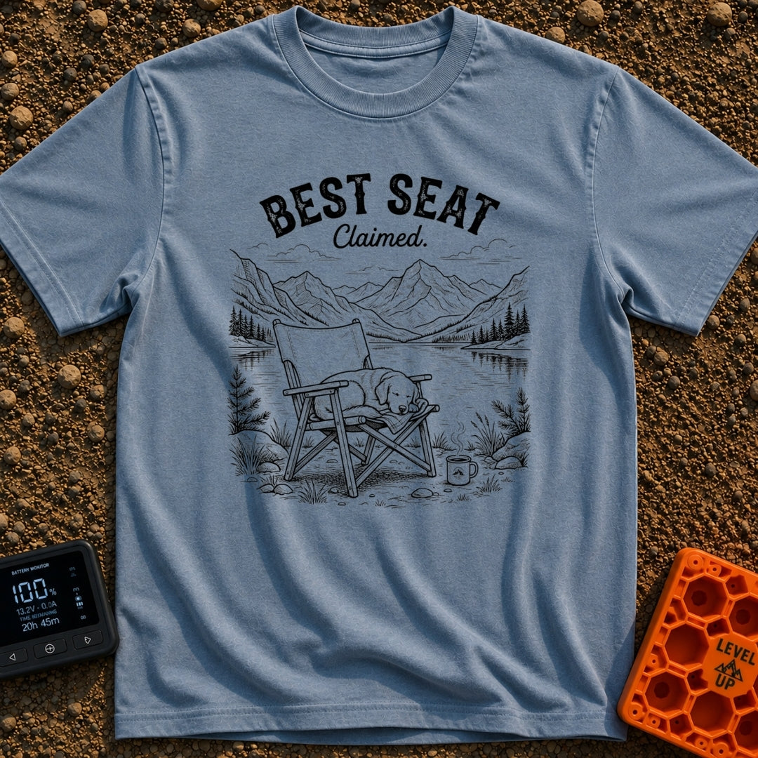 Best Seat Claimed - T-Shirt in Blue Jean - A black-and-white line drawing of a dog sleeping curled up in a folding camp...