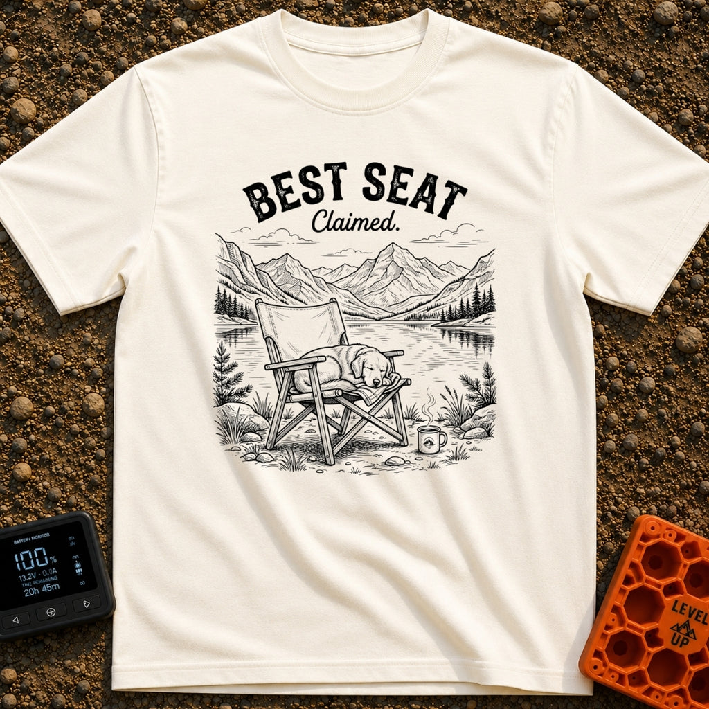Best Seat Claimed - T-Shirt in Ivory - A black-and-white line drawing of a dog sleeping curled up in a folding camp...