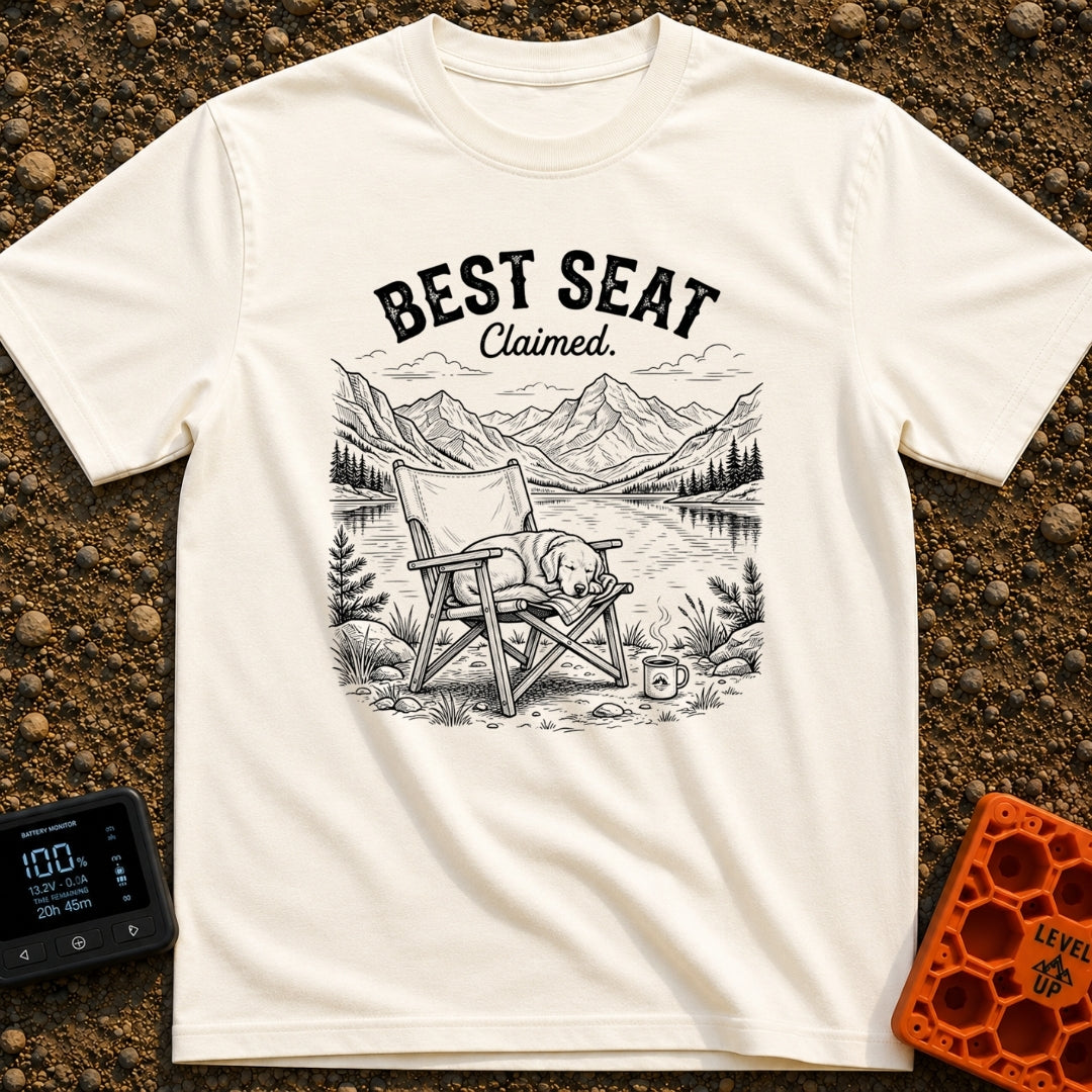 Best Seat Claimed - T-Shirt in Ivory - A black-and-white line drawing of a dog sleeping curled up in a folding camp...