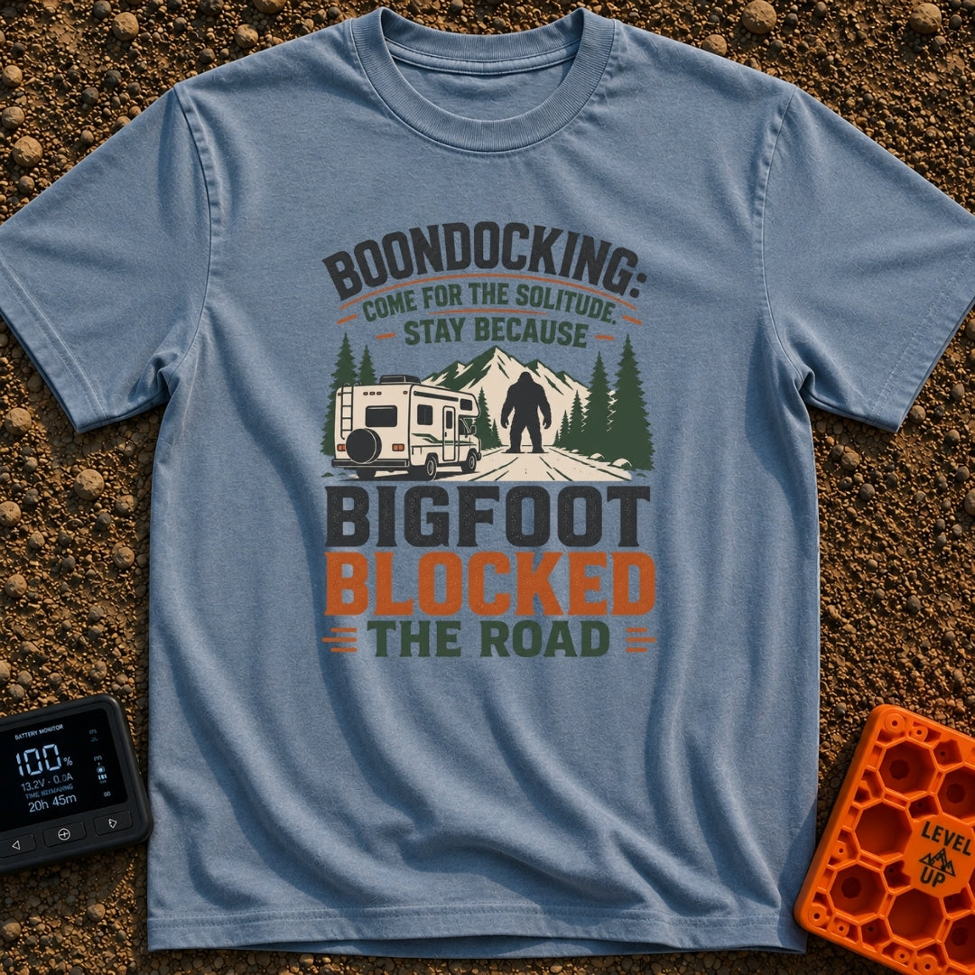 Bigfoot Right Of Way - T-Shirt in Blue Jean - An illustration of a Class C motorhome stopped on a dirt road facing a...