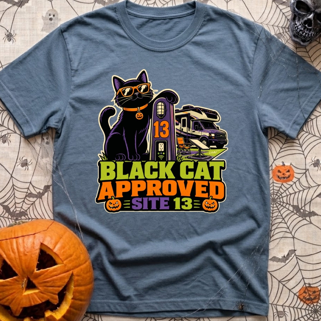 Black Cat Approved - T-Shirt in Blue Jean - A black cat wearing orange sunglasses and a pumpkin collar tag leans on a...