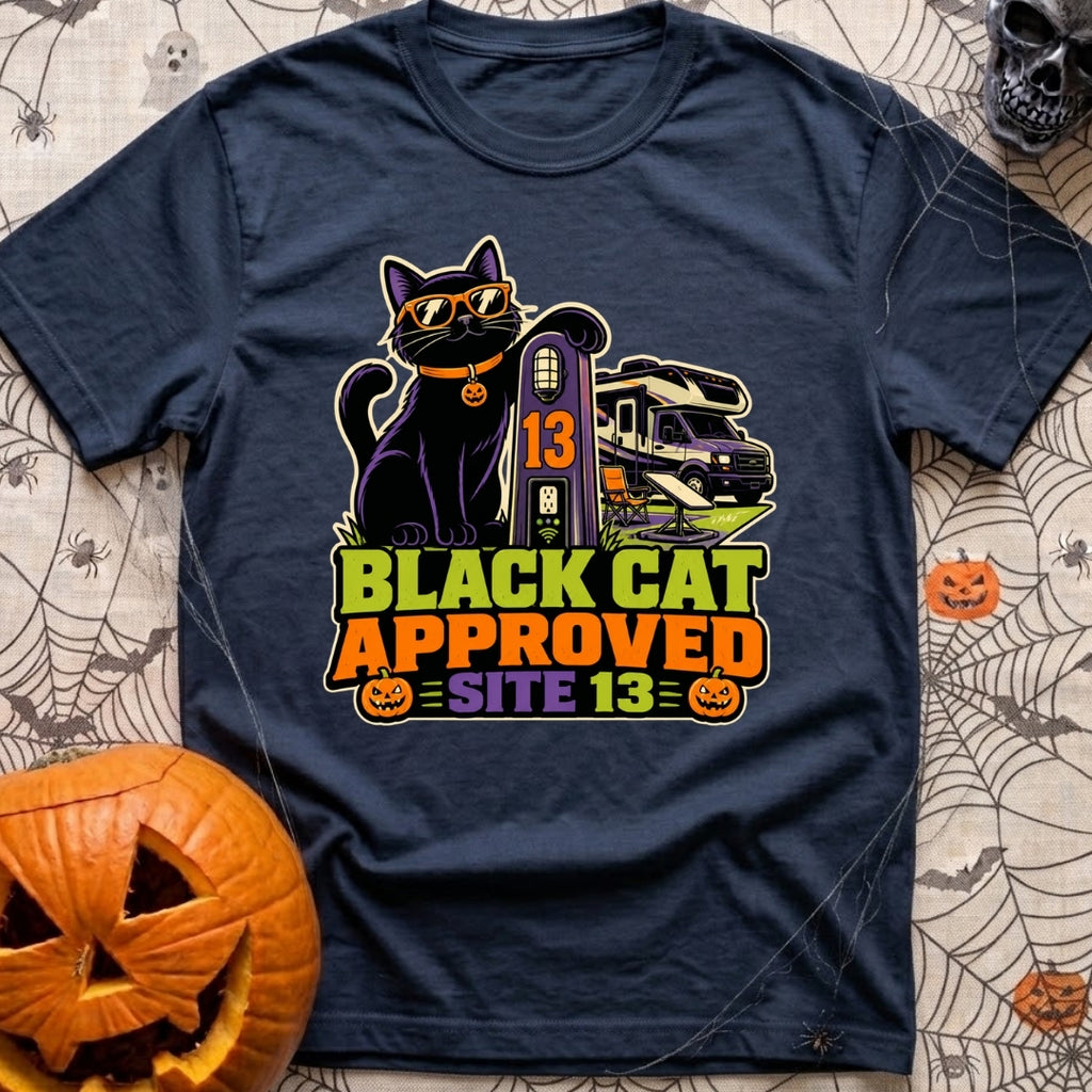 Black Cat Approved - T-Shirt in Navy - A black cat wearing orange sunglasses and a pumpkin collar tag leans on a campsite...
