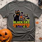 Black Cat Approved - T-Shirt in Pepper - A black cat wearing orange sunglasses and a pumpkin collar tag leans on a...