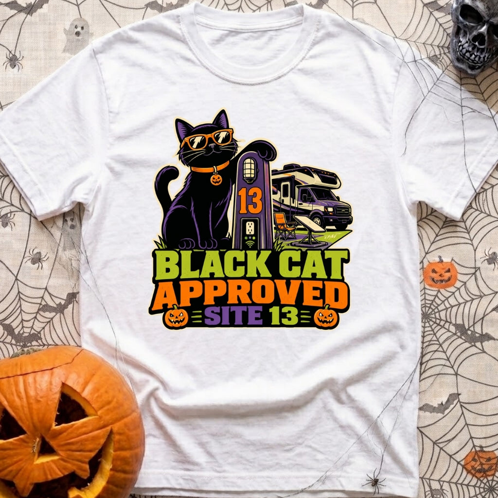 Black Cat Approved - T-Shirt in White - A black cat wearing orange sunglasses and a pumpkin collar tag leans on a...