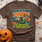Black Tank Volunteers Needed - T-Shirt in Espresso - Three cartoon skeletons in casual camping attire stand next to a...