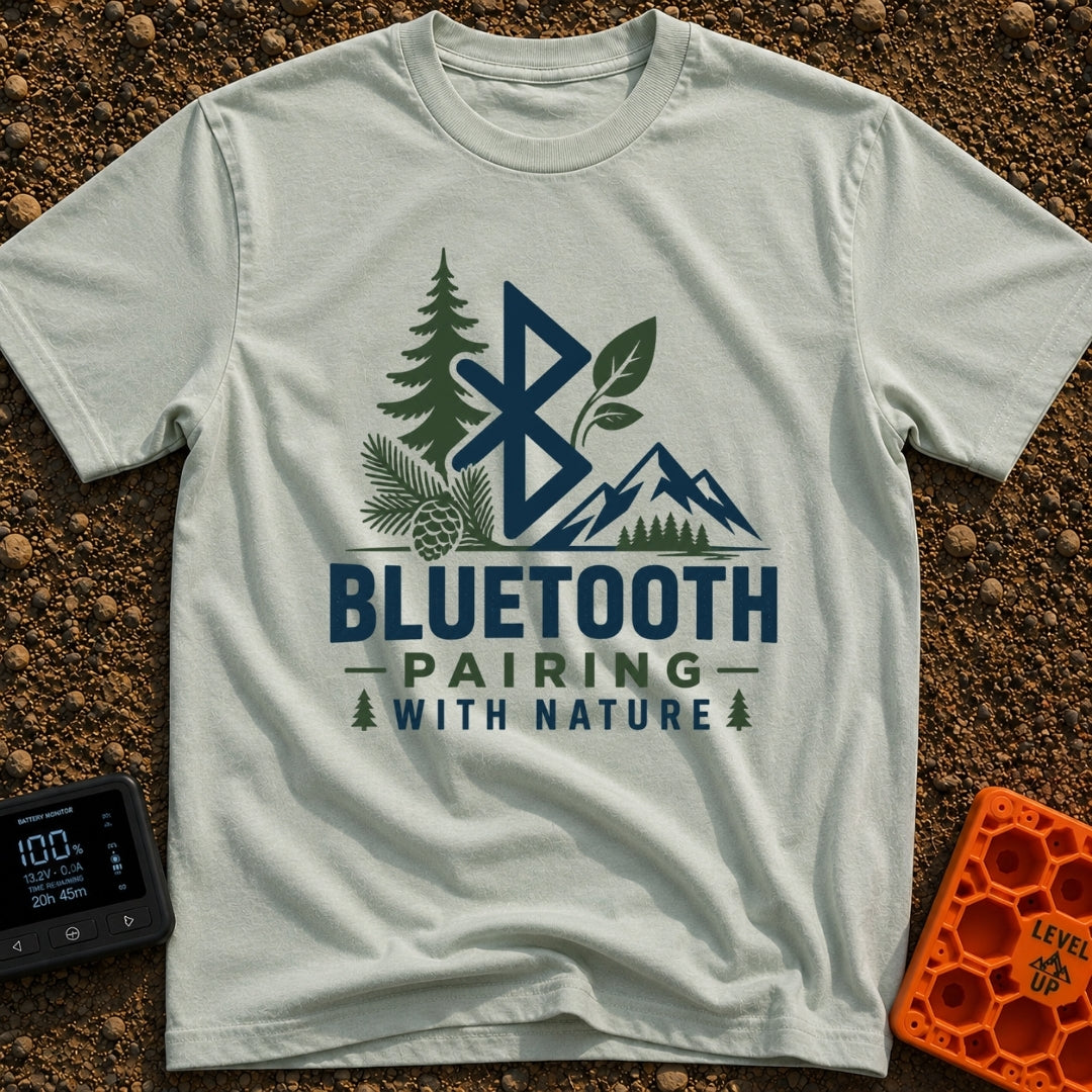 Pairing With Nature - T-Shirt in Bay - A large Bluetooth logo is surrounded by illustrations of a pine tree, a pinecone,...