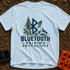 Pairing With Nature - T-Shirt in Chambray - A large Bluetooth logo is surrounded by illustrations of a pine tree, a...