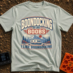 Boondocking Like Boobs - T-Shirt in Bay - A retro-style illustration of a Class C motorhome parked in a nature setting...