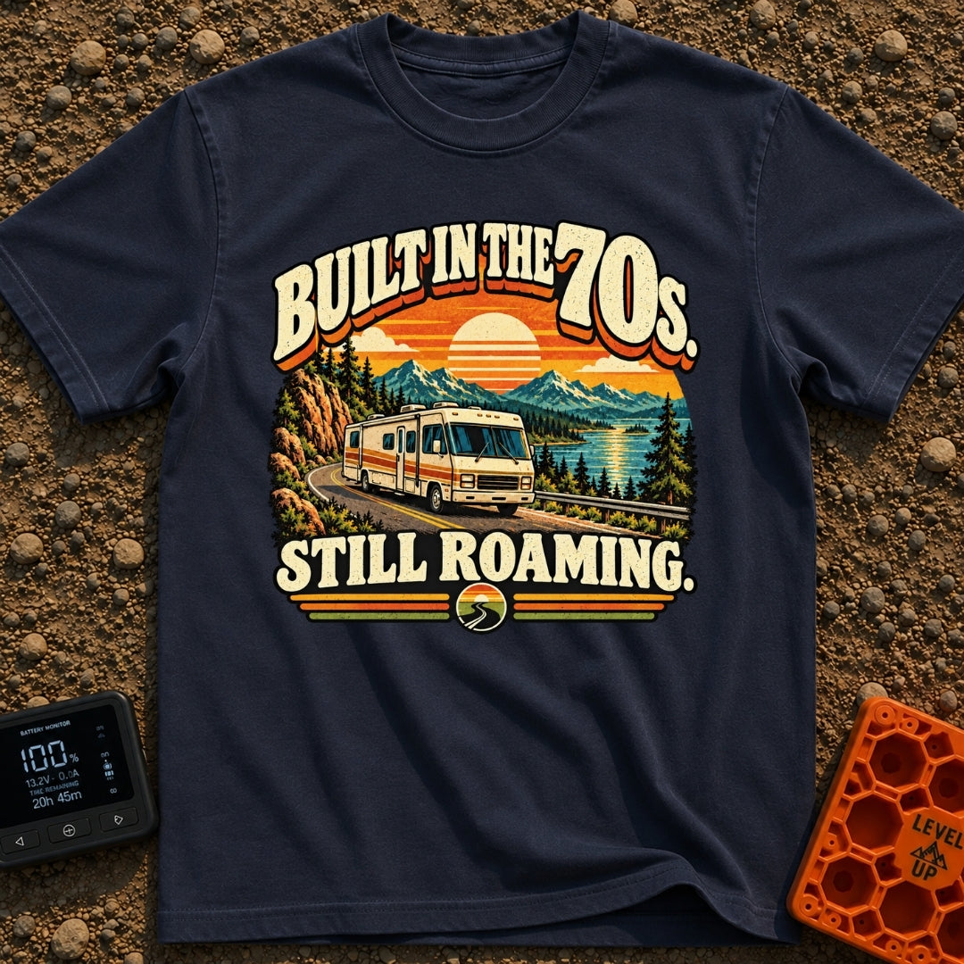 Born In A Barn - T-Shirt in Navy - A retro-style illustration of a vintage Class A motorhome driving along a winding road...