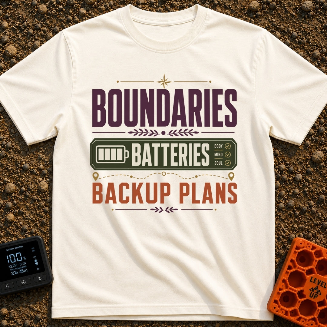 Boundaries And Batteries - T-Shirt in Ivory - A typographic design featuring the stacked words 'BOUNDARIES', 'BATTERIES',...