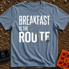 Route To Breakfast - T-Shirt in Blue Jean - A minimalist illustration of a winding two-lane road with double yellow lines...