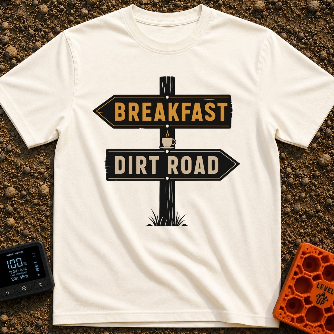 Breakfast Next Dirt Road - T-Shirt in Ivory - A graphic of a wooden directional signpost with two arrows; the top arrow...