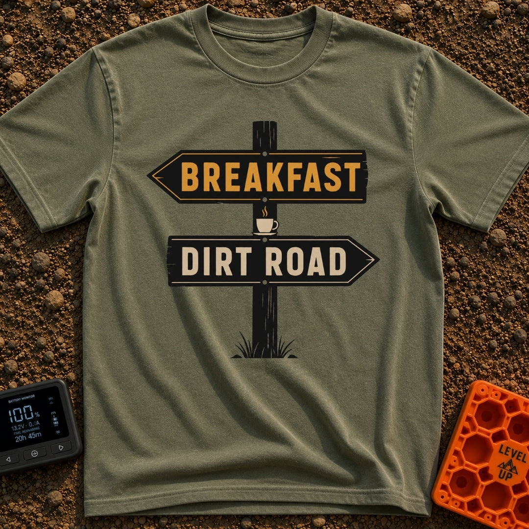 Breakfast Next Dirt Road - T-Shirt in Moss - A graphic of a wooden directional signpost with two arrows; the top arrow...