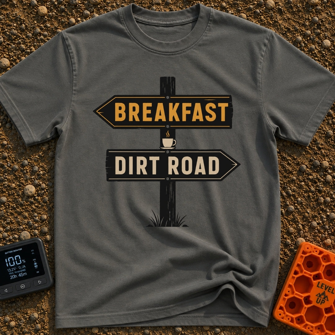 Breakfast Next Dirt Road - T-Shirt in Pepper - A graphic of a wooden directional signpost with two arrows; the top arrow...