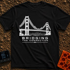 Bridging The Bars - T-Shirt in Black - A black and white illustration of a suspension bridge where the vertical cables...