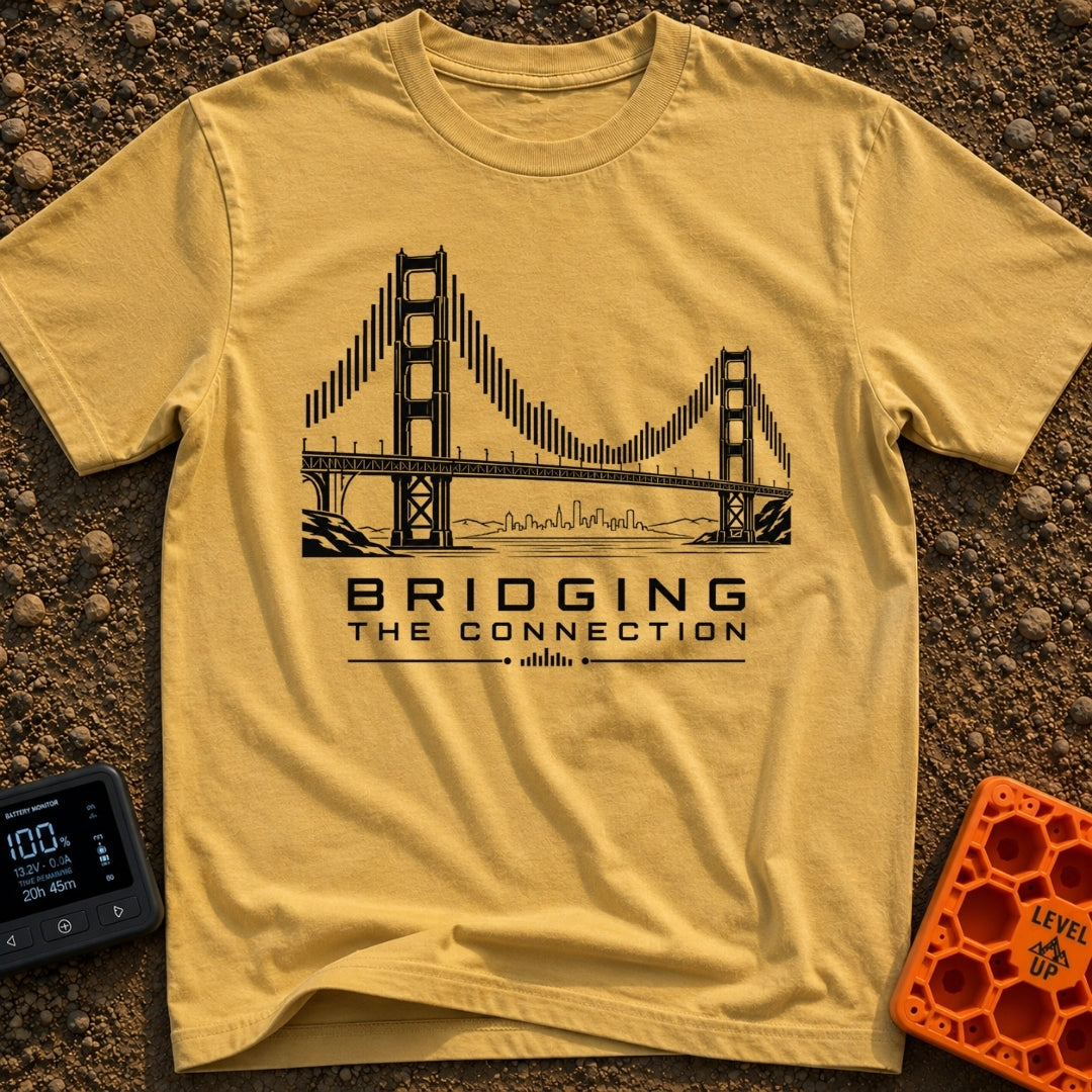 Bridging The Bars - T-Shirt in Mustard - A black and white illustration of a suspension bridge where the vertical cables...